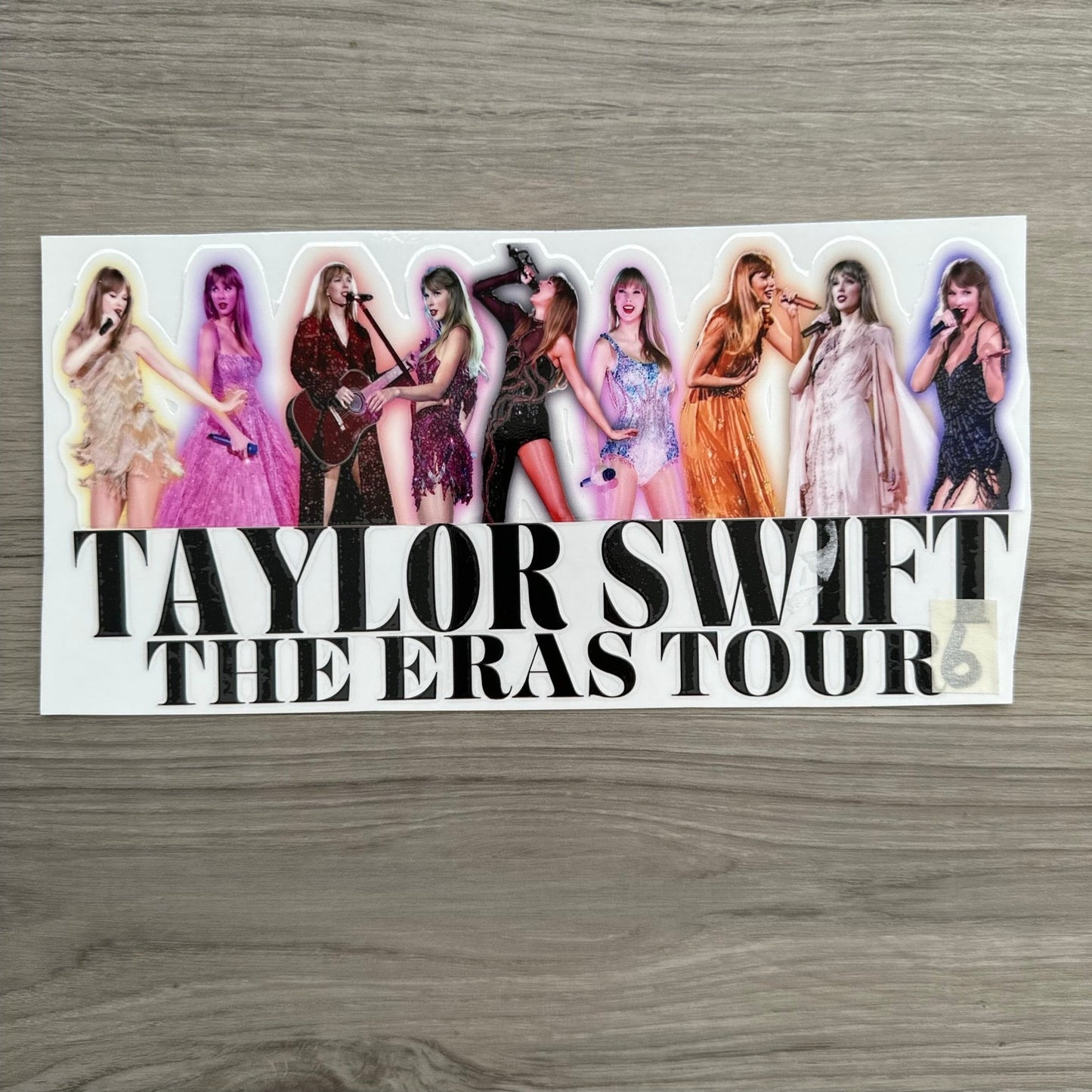 Taylor Swift Eras Tour wrap, with Taylor in each of the eras outfits. These are actual photos from her concert