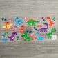 Dinosaurs all around the wrap, with little footprints, eggs and "roar". This is bright and colourful