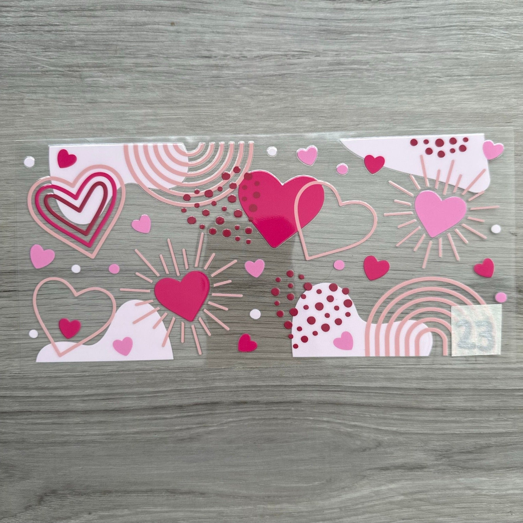 A 160oz Wrap with hearts of many sizes and pink variants