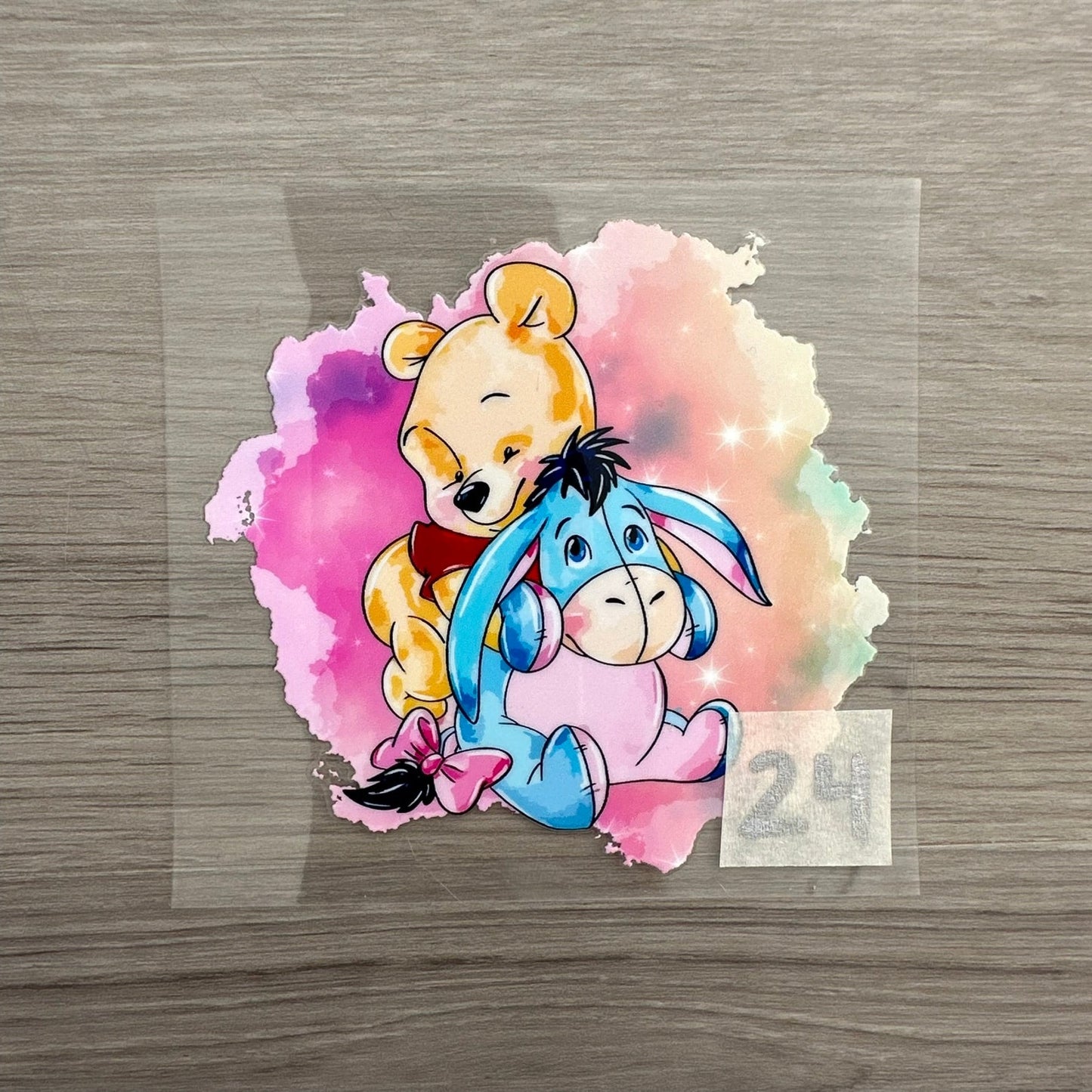 Winnie The Pooh and Eeyore Decal with a water colour background behind them